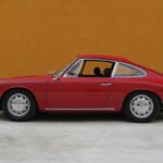 Porsche 911 2.0 Coupé del 1965 rossa — vista laterale